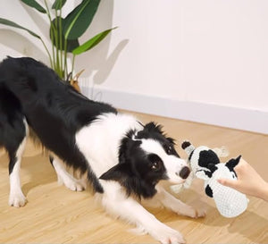 Black and white PAWABY squeaky cow dog toy