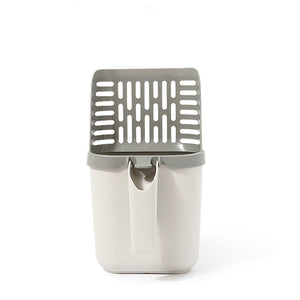 Cat litter scoop with integrated waste collection compartment