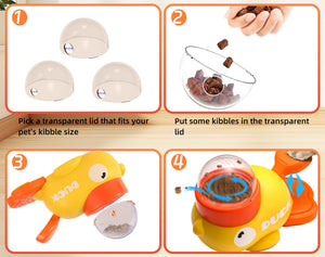 Dog pressing the pedal on the PAWABY treat dispenser