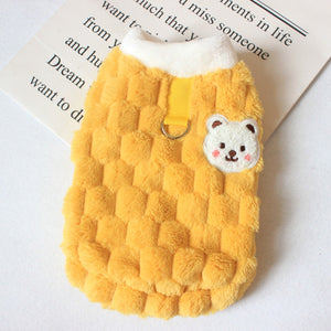 Small dog wearing yellow fluffy PAWABY gilet