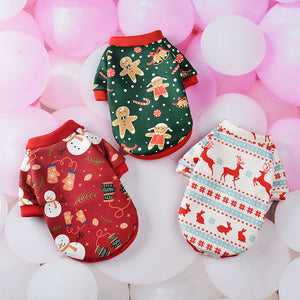 Three PAWABY Christmas dog T-shirts in gingerbread, snowman and reindeer prints