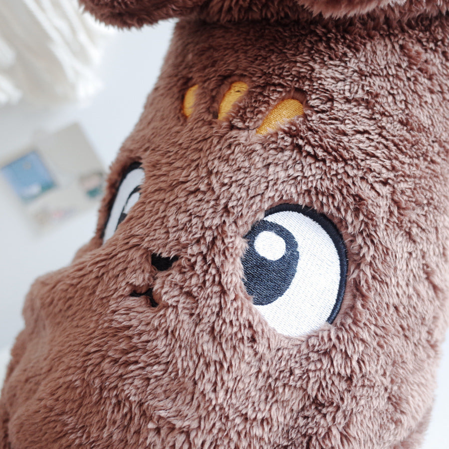 Close-up of embroidered eyes on the Brown plush dog hoodie