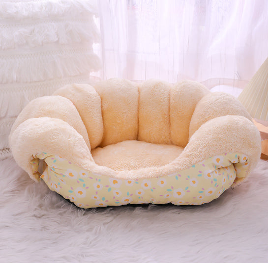 Floral cat bed arranged as a covered cave