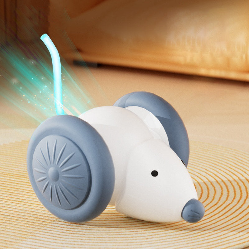 ndoor cat chasing the PAWABY Smart Electric Mouse Cat Toy during interactive play.