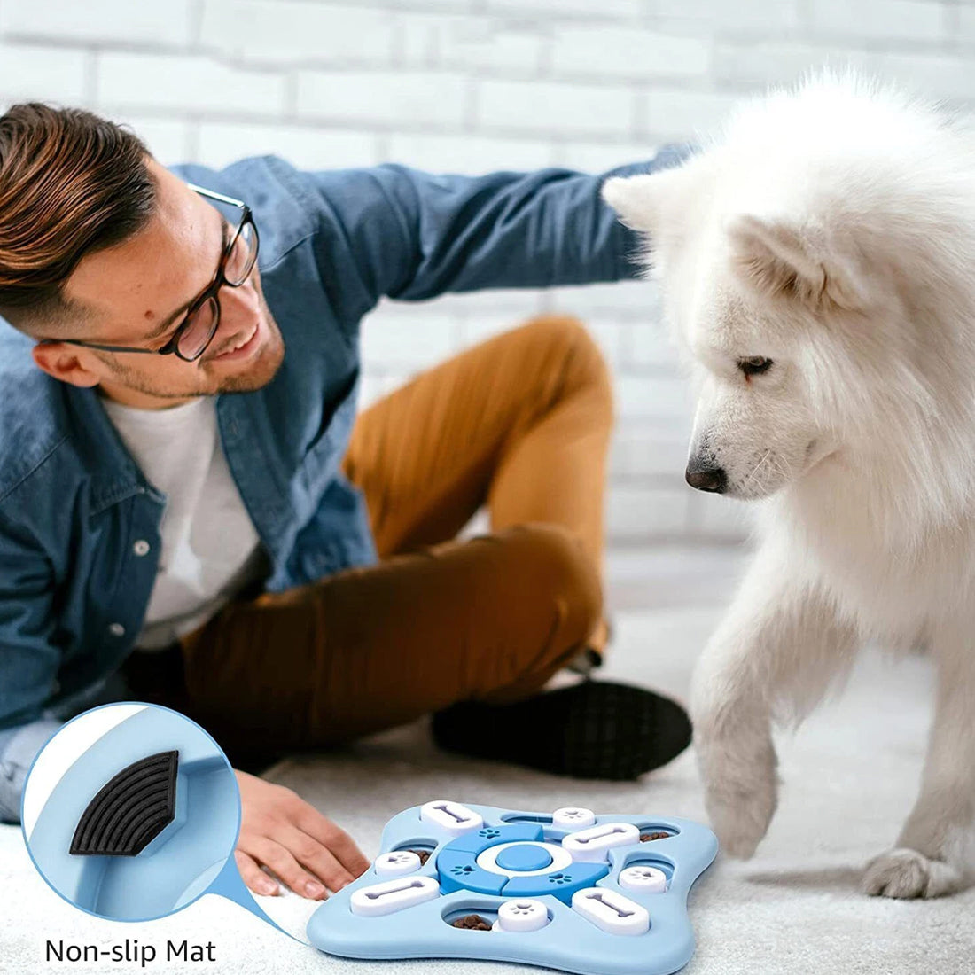 Dog enjoying a treat dispensing puzzle game during indoor play.