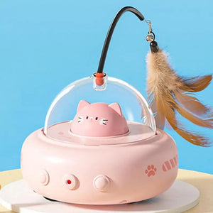 Indoor cat enjoying independent play with the PAWABY feather teaser toy