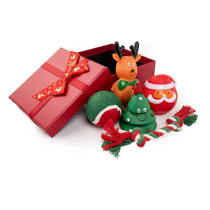 Dog enjoying the PAWABY Christmas toy during the festive season.