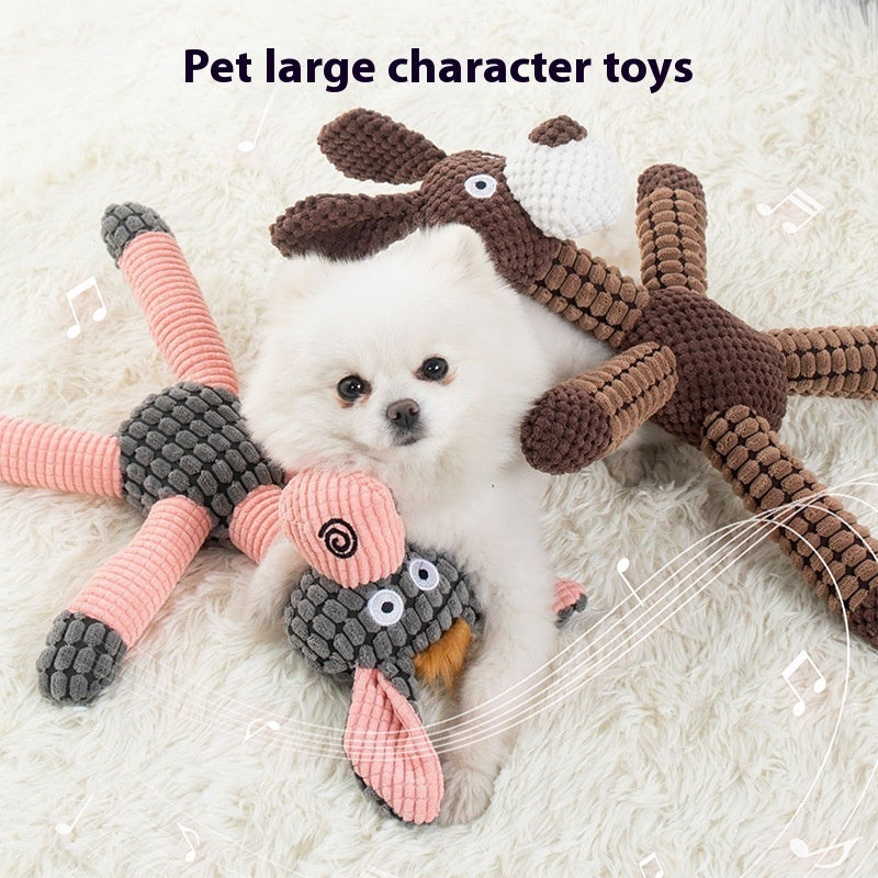 Soft plush dog toy with built-in squeaker for interactive fun.