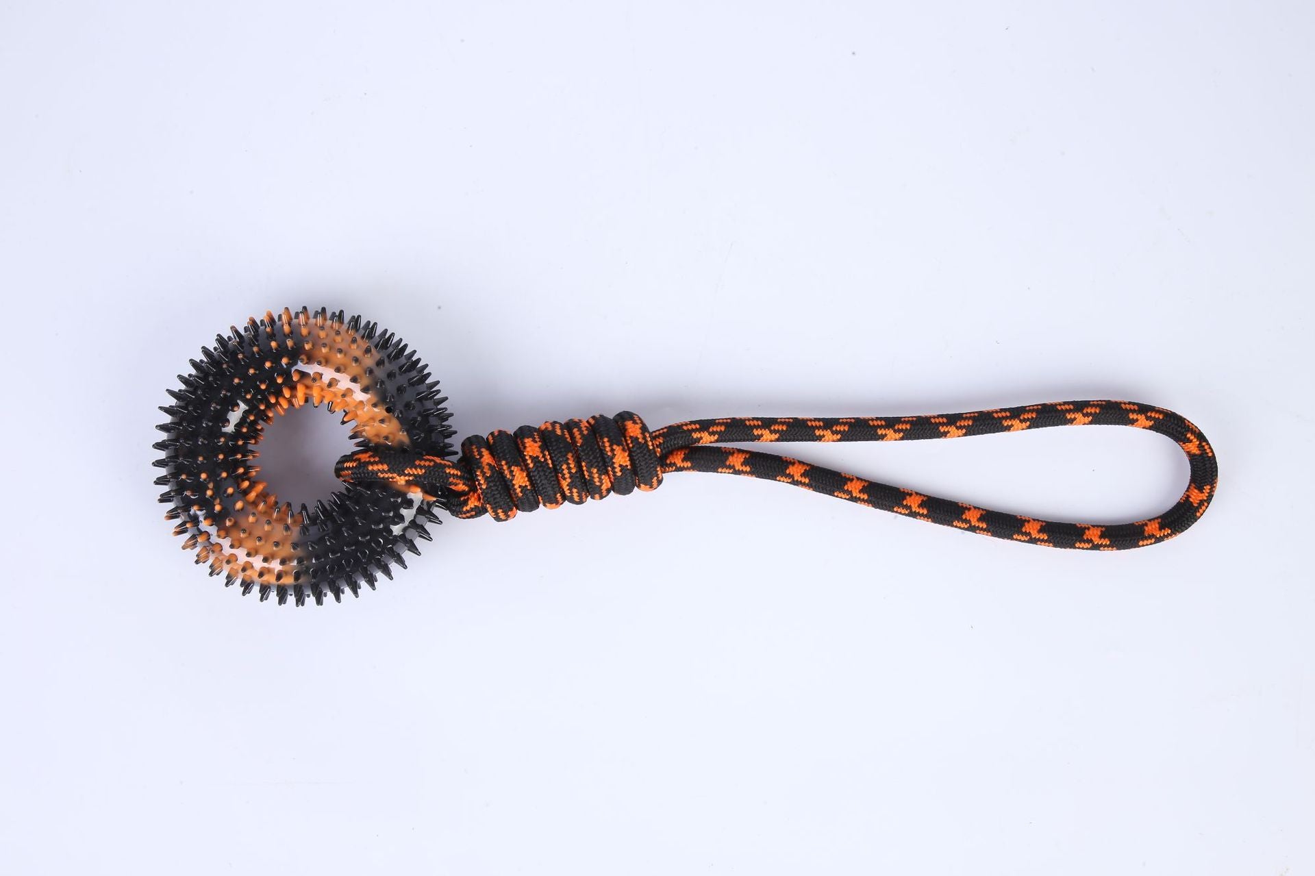 Tug of war dog toy with durable cotton rope construction.