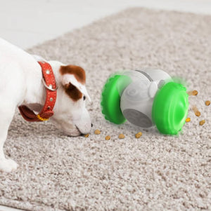 Cat playing with the PAWABY wobble treat toy indoors.