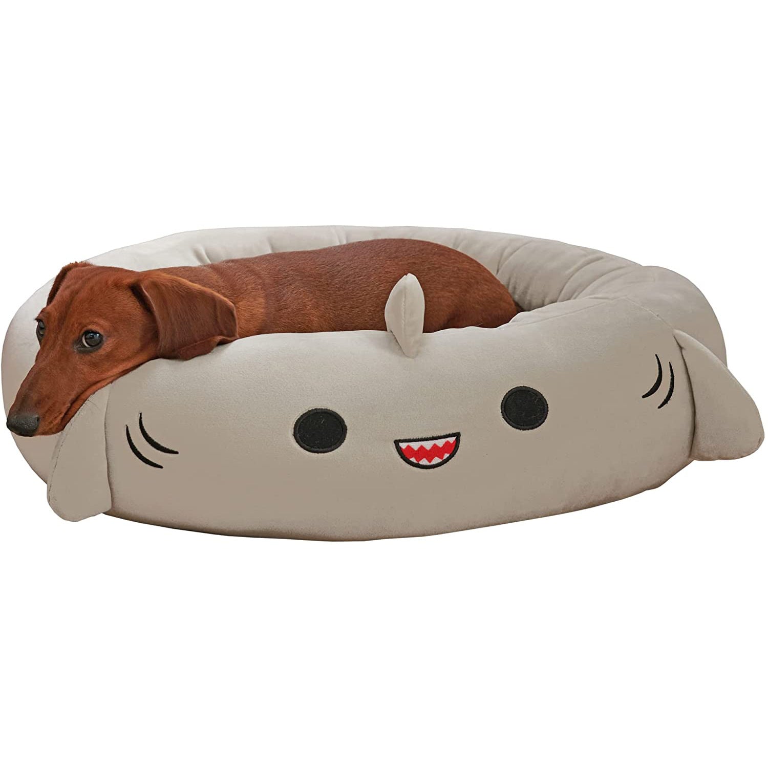 Close-up of soft plush fabric on grey shark dog bed